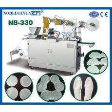 NB-330型暖寶寶包裝機，全自動發(fā)熱貼生產(chǎn)設(shè)備